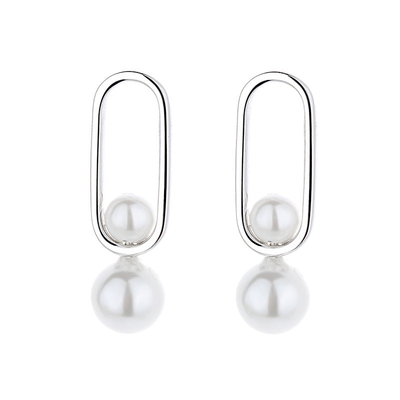 Women's Stud Earrings with Modern Oval Design and Elegant Pearls