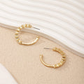 Women's Hoop Earrings with Intricate Structures