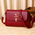 Women's Structured Pebble Leather Crossbody Satchel with Gold Hardware