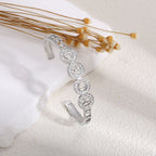 Women's Bangle with Elegant Infinity Pattern and Sparkling Zirconia