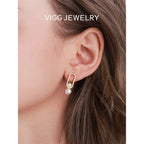 Women's Stud Earrings with Modern Oval Design and Elegant Pearls