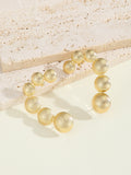 Women's Bracelet with Structured, Golden Beads