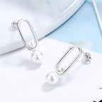 Women's Stud Earrings with Modern Oval Design and Elegant Pearls