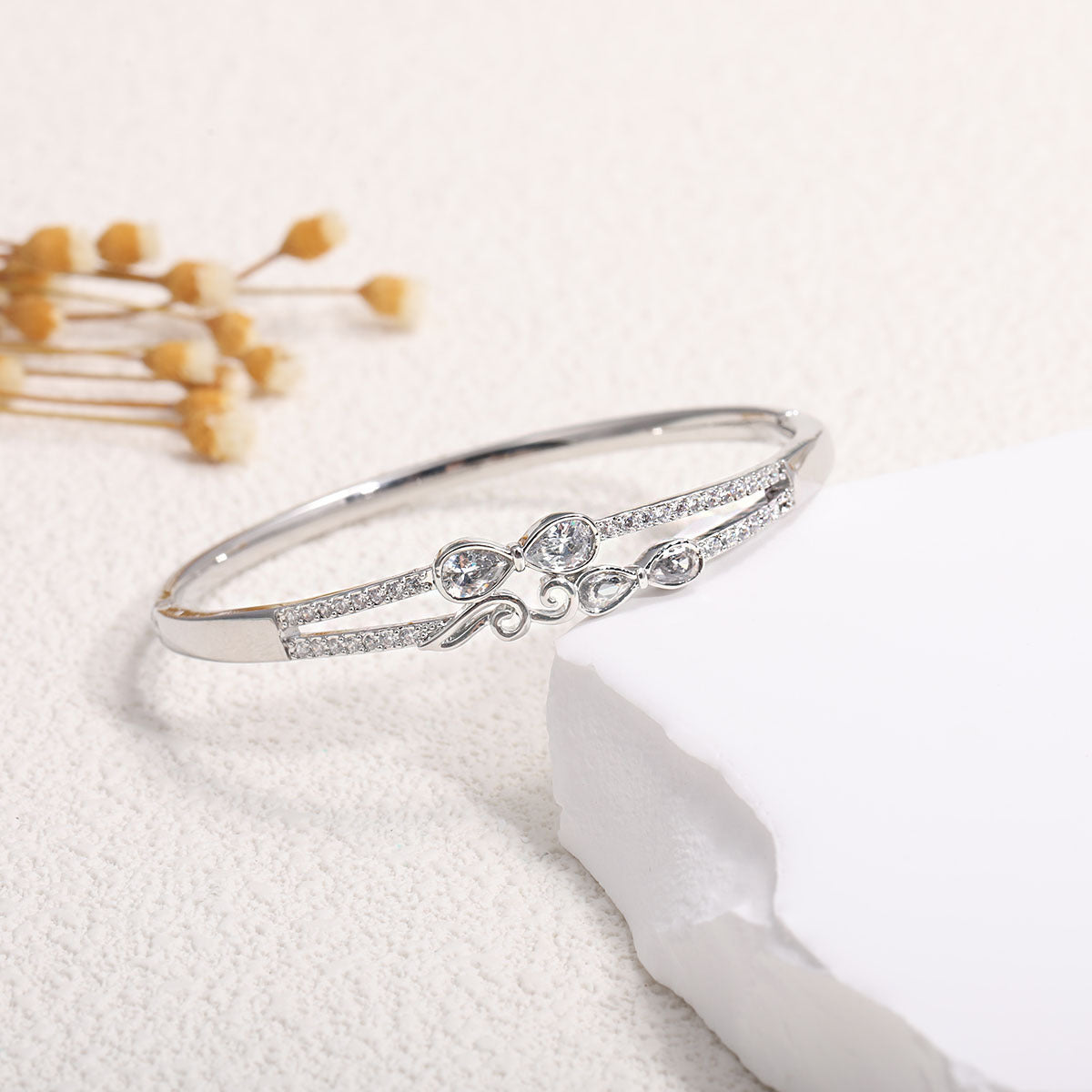 Women's Bangle with Elegant Infinity Pattern and Sparkling Zirconia