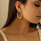 Women's Hoop Earrings with Intricate Structures