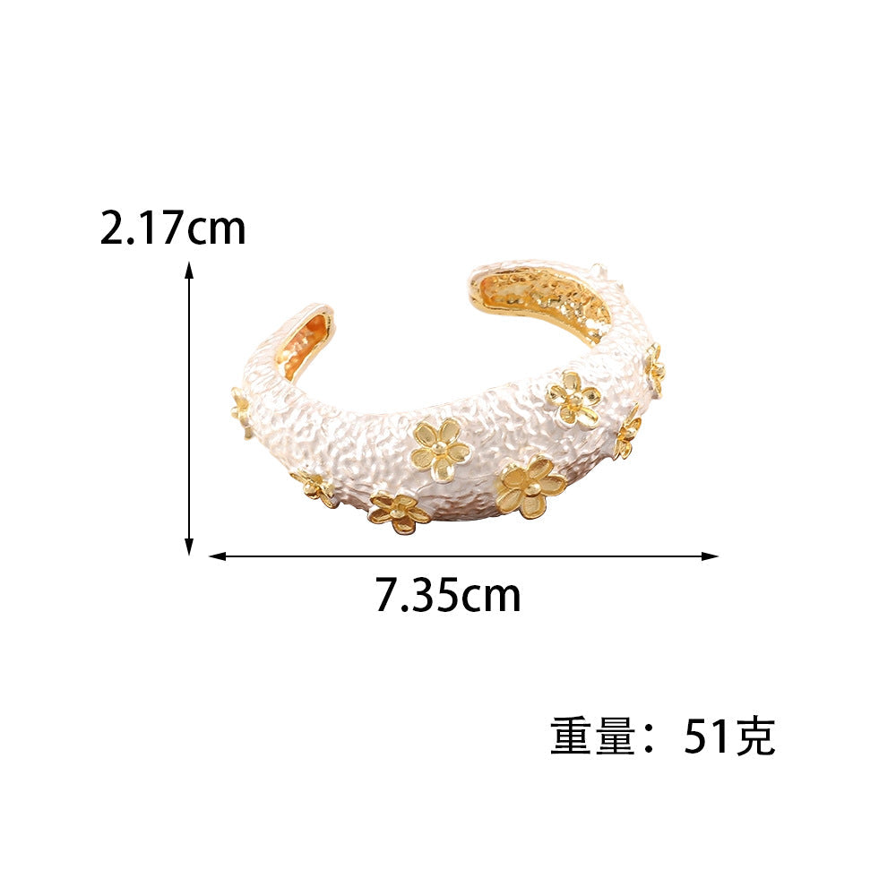 Women's Bracelet with Intricate Flower Design