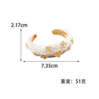 Women's Bracelet with Intricate Flower Design