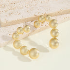 Women's Bracelet with Structured, Golden Beads