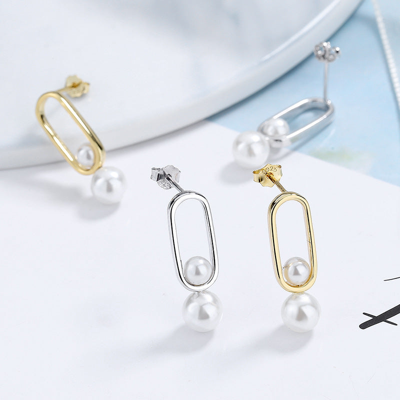 Women's Stud Earrings with Modern Oval Design and Elegant Pearls