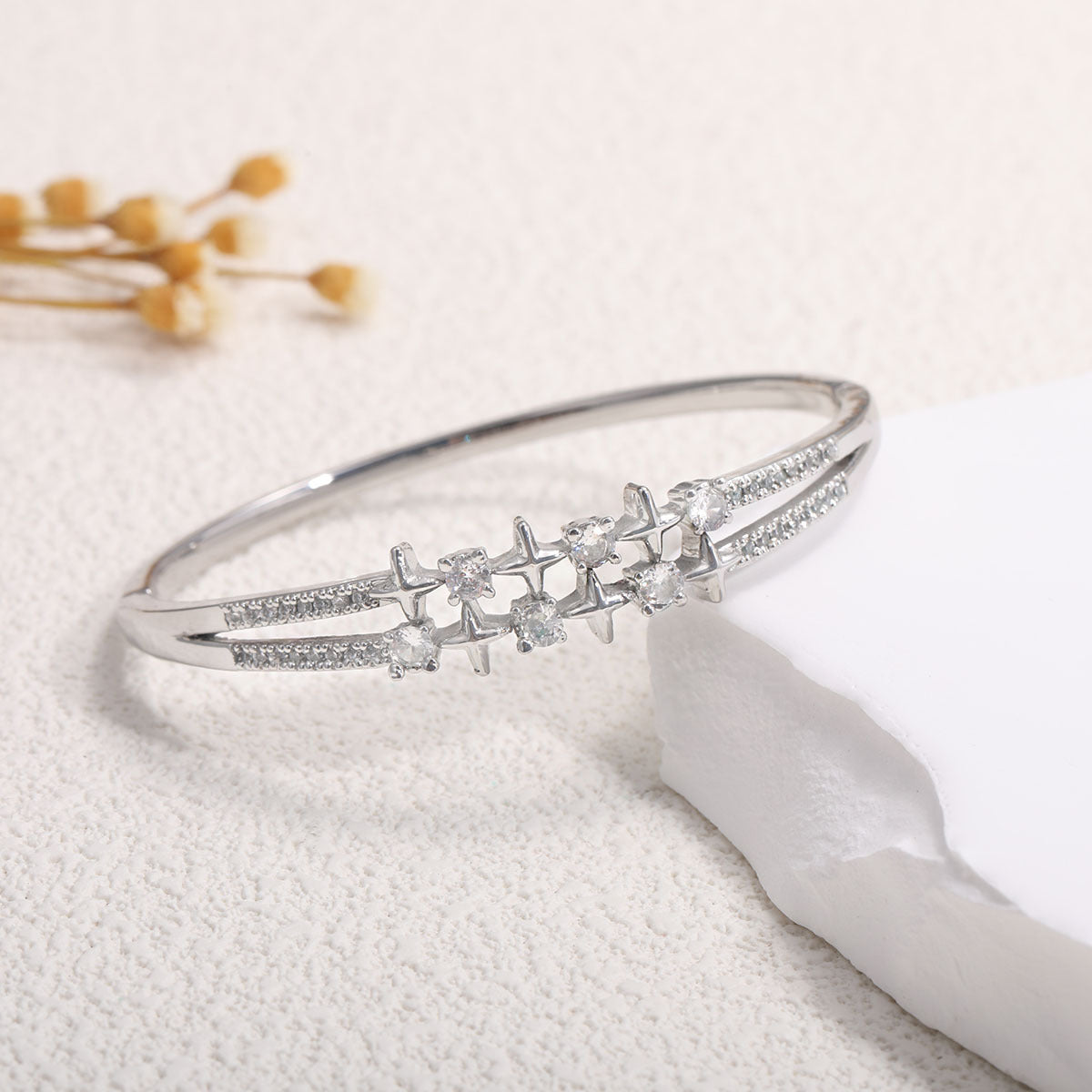 Women's Bangle with Elegant Infinity Pattern and Sparkling Zirconia