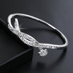 Women's Bangle with Elegant Infinity Pattern and Sparkling Zirconia