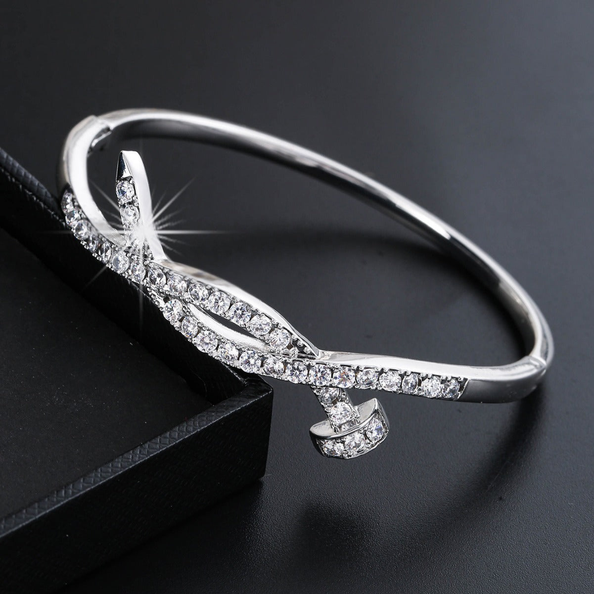 Women's Bangle with Elegant Infinity Pattern and Sparkling Zirconia