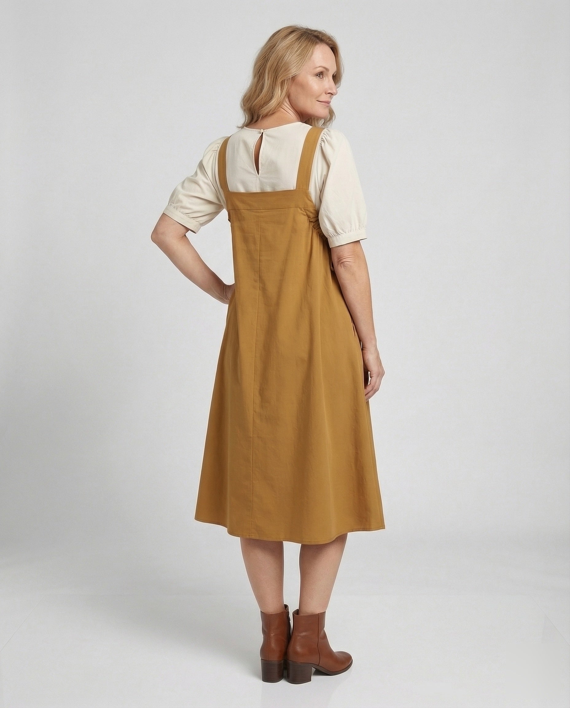 Women's Sleeveless Overall Dress with Pleated Skirt - Back View