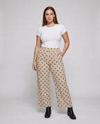 Women's Elastic Cropped Pants with Polka Dot Pattern - Front View