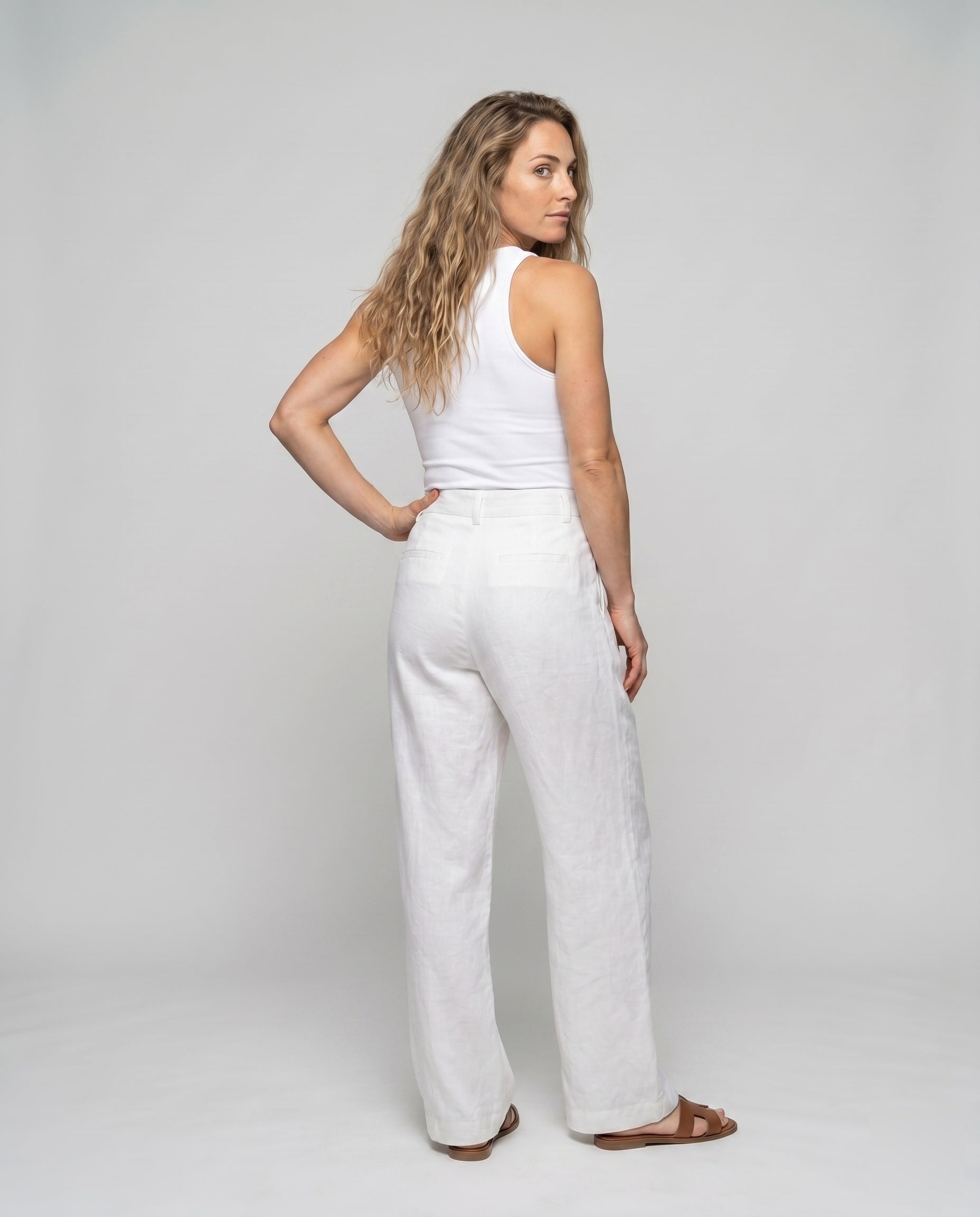 Women's Wide Linen Pants with High Waist, Pleats, and Side Pockets - Back View