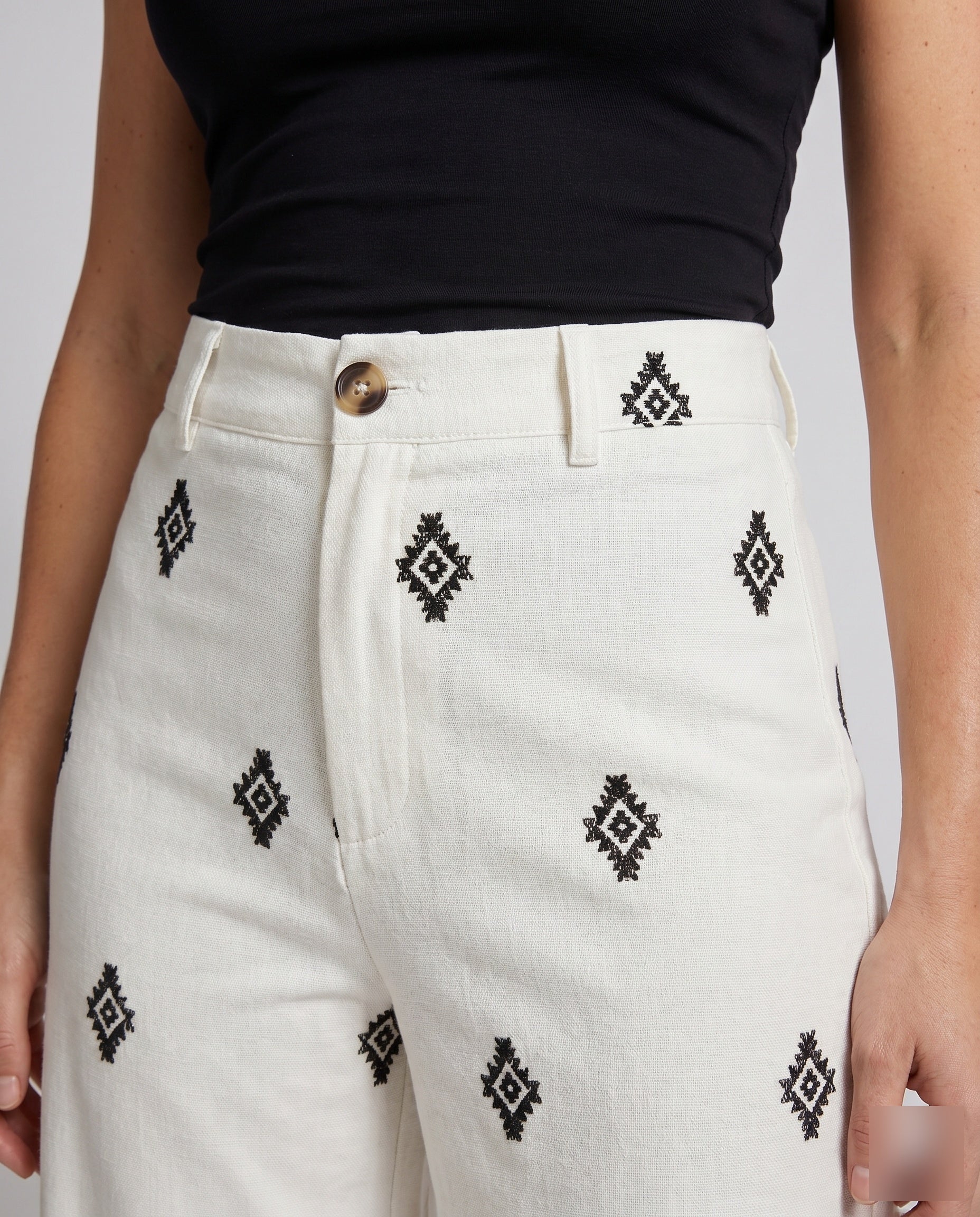 Women's Wide Fabric Trousers with Elegant Boho Pattern - Close-Up Detail