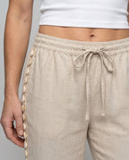 Women's Airy Linen Trousers with High Waistband and Side Ruffles - Close-Up Detail