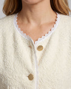 Women's Cardigan with Elegant Lace Accents and Practical Pockets - Close-Up Detail