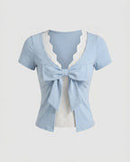 Women's Blouse with Playful Bow Design and Elegant Lace Embellishment