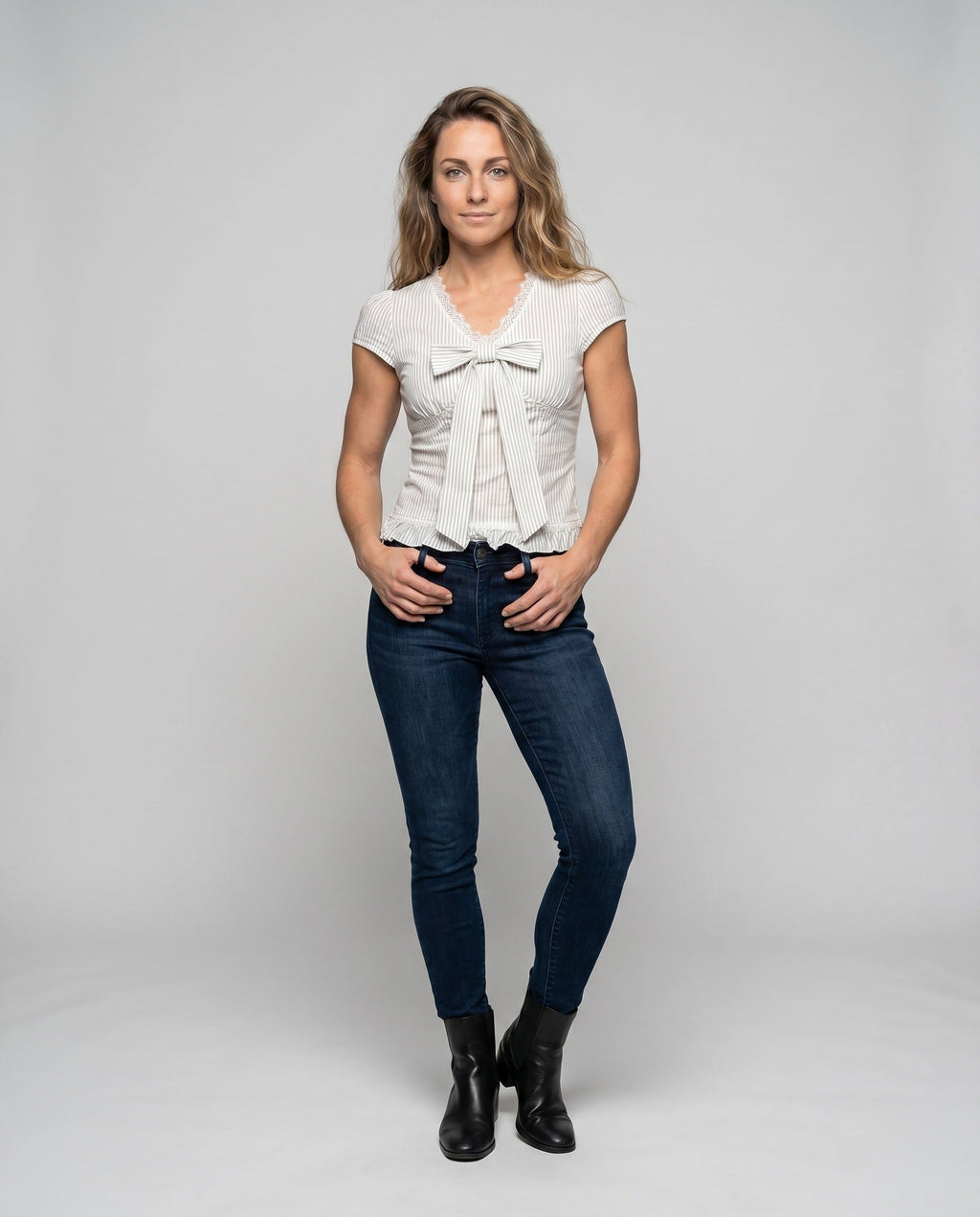 Women's Blouse Shirt with Playful Bow Design and Ruffle Hem - Front View