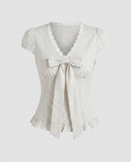 Women's Blouse Shirt with Playful Bow Design and Ruffle Hem