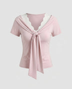 Women's Top with Decorative Bow and Delicate Lace Accents