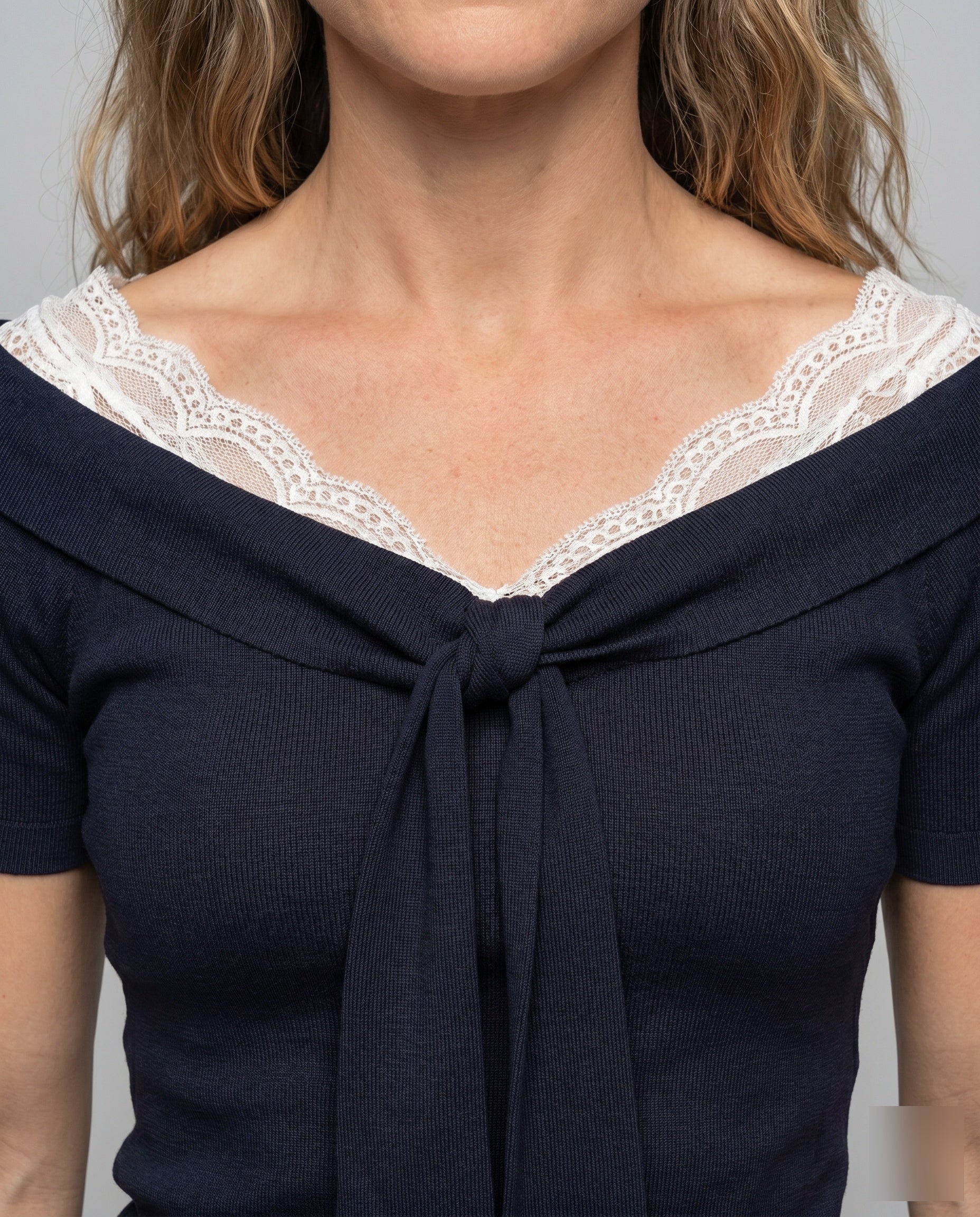 Women's T-Shirt with Feminine Lace Embellishment and Decorative Bow - Close-Up Detail