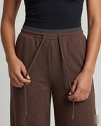 Women's High-Waisted Wide Jogging Pants with Drawstring Front Seam - Close-Up Detail