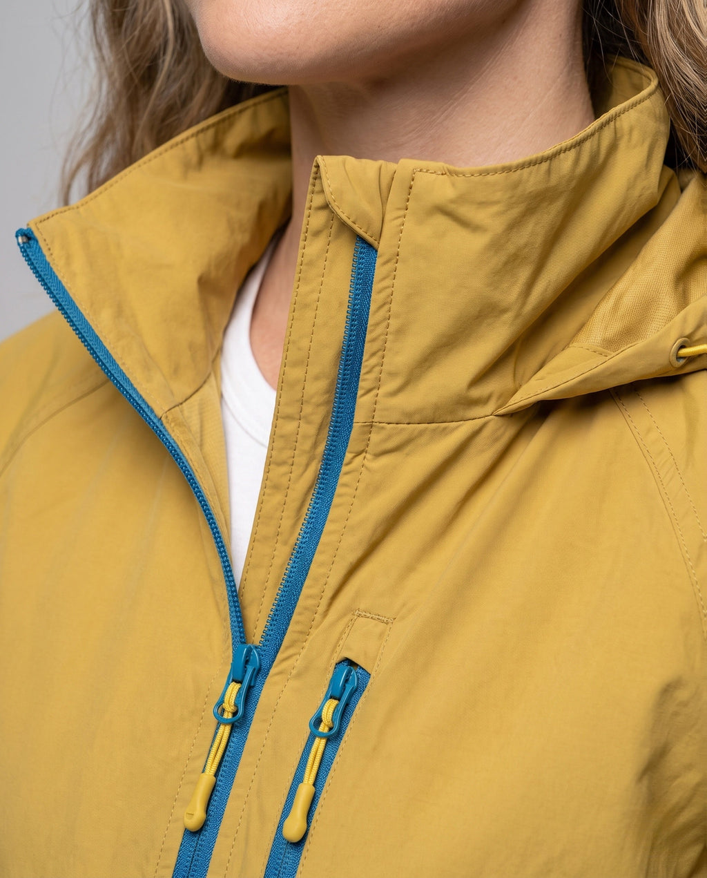 Women's Waterproof Lightweight Jacket with Functional Zipper Pockets - Close-Up Detail