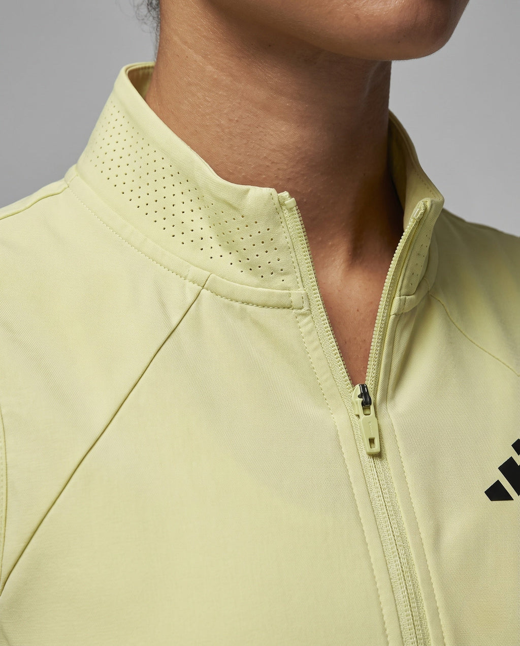 Women's Sporty Quilted Vest with High Collar - Close-Up Detail