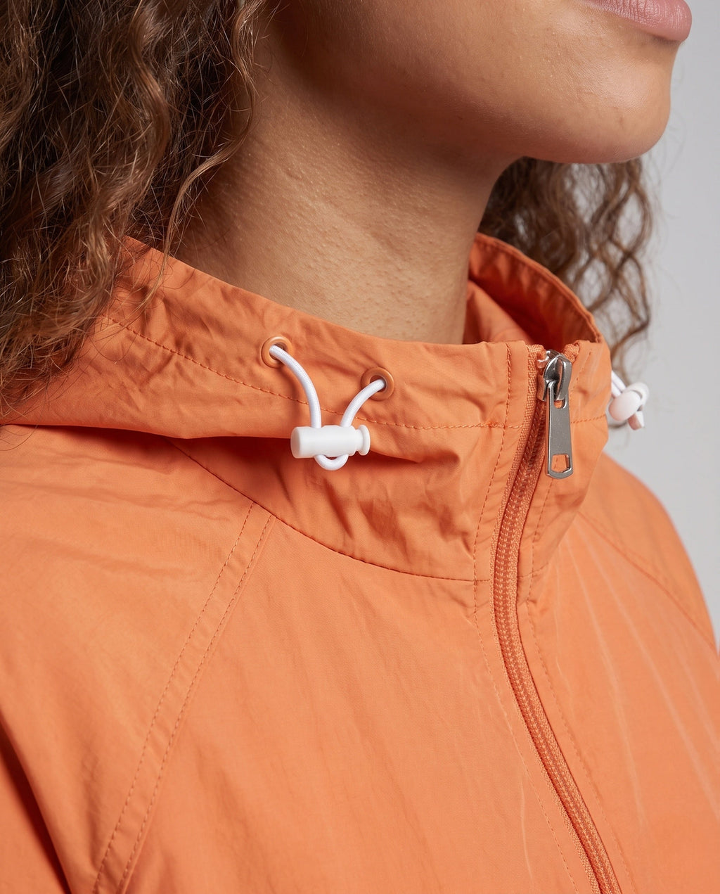 Women's Lightweight Windbreaker Jacket with Adjustable Hood - Close-Up Detail