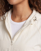 Women's Lightweight Windbreaker with Adjustable Hood Design - Close-Up Detail