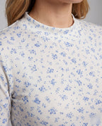 Ladies blouse with fresh floral print and playful ruffled hem - Chichicherry