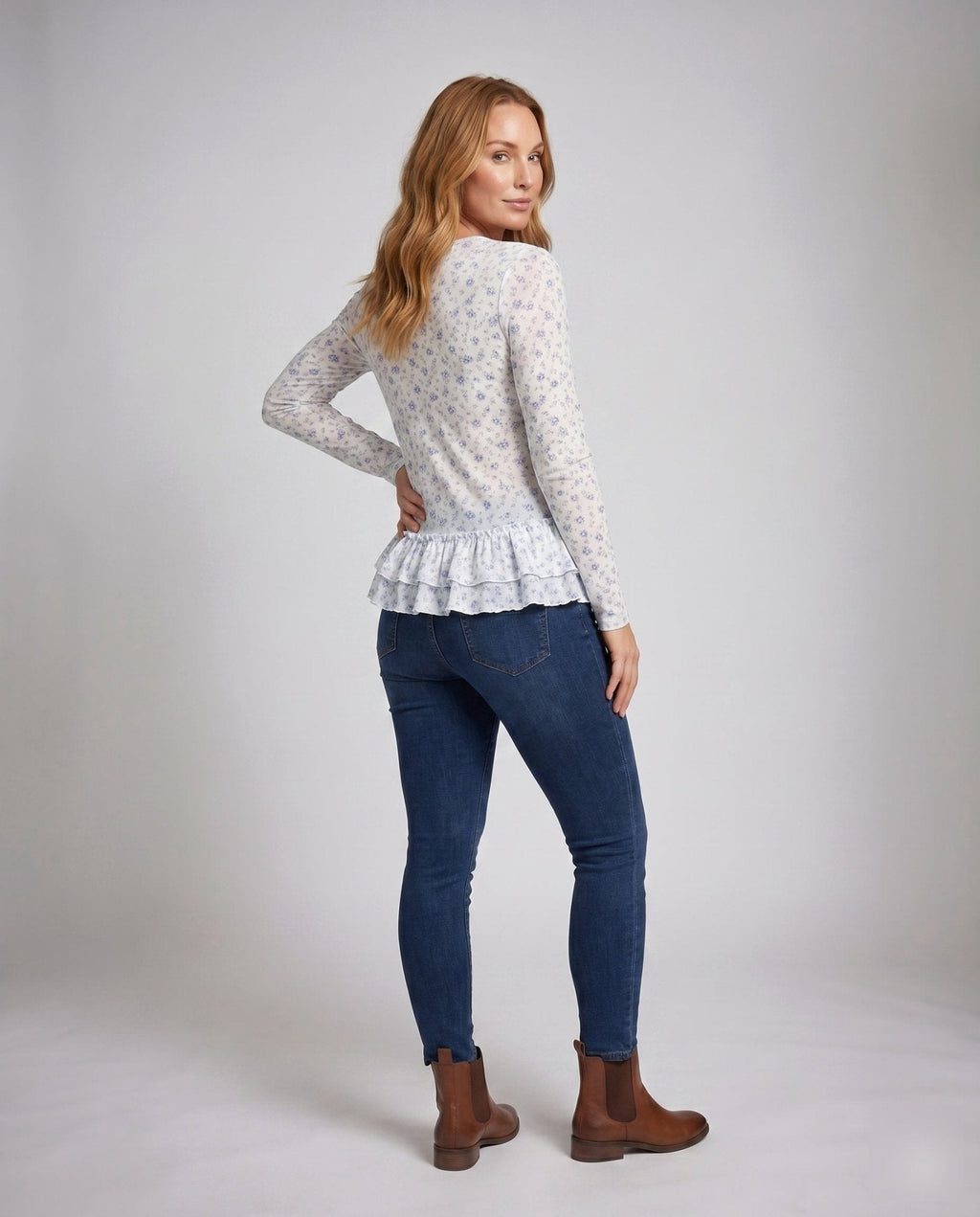 Ladies blouse with fresh floral print and playful ruffled hem - Chichicherry