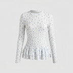 Ladies blouse with fresh floral print and playful ruffled hem - Chichicherry