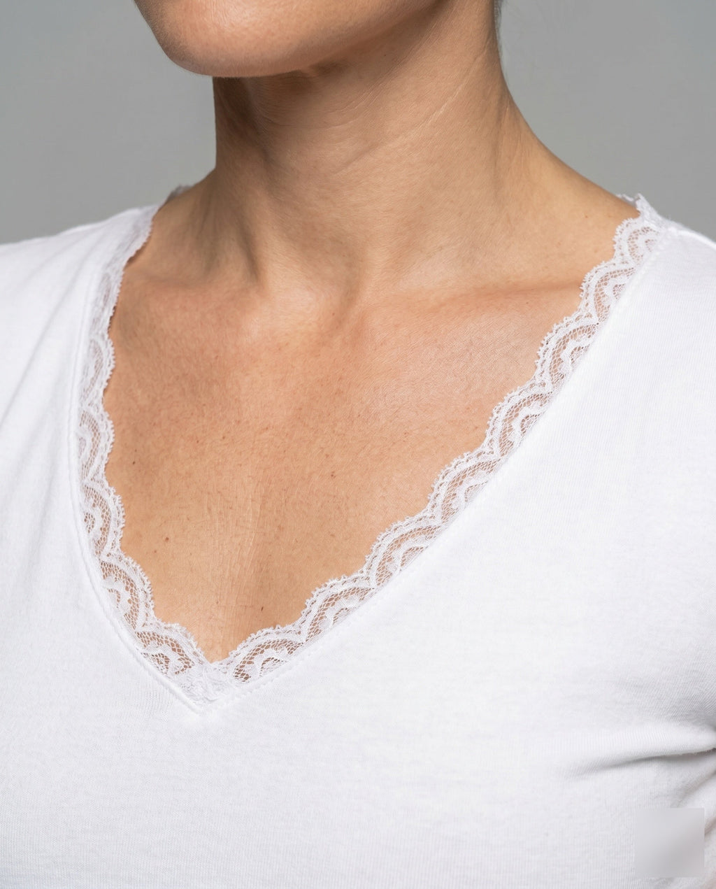 Women's T-Shirt with Lace Collar and Charming Heart Pendant - Close-Up Detail
