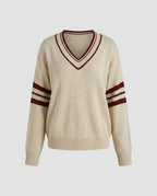 Women's knit sweater with deep V-neck and sporty stripes - Chichicherry