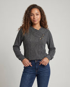Women's knit sweater with diagonal button decoration and textured surface - Chichicherry