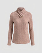 Women's knit sweater with elegant collar structure and decorative button details - Chichicherry