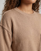 Women's knit sweater with unique structural details and a practical chest pocket - Chichicherry