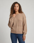 Women's knit sweater with unique structural details and a practical chest pocket - Chichicherry