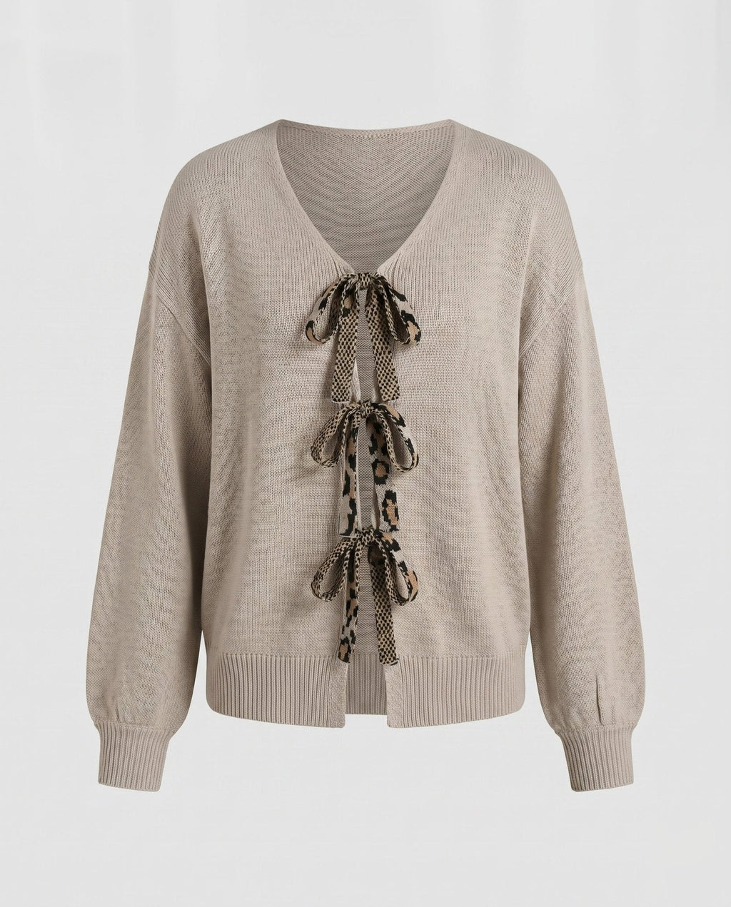 Women's knitted sweater with fashionable V-neck and bow elements - Chichicherry