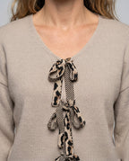 Women's knitted sweater with fashionable V-neck and bow elements - Chichicherry