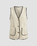 Women's knitted vest with contrasting seams and practical pockets - Chichicherry