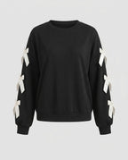 Women's sweatshirt with decorative ribbons on the sleeves - Chichicherry