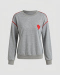 Women's sweatshirt with heart-shaped appliqués and trendy contrast stitching - Chichicherry