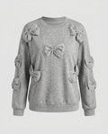 Women's sweatshirt with playful bow design - Chichicherry